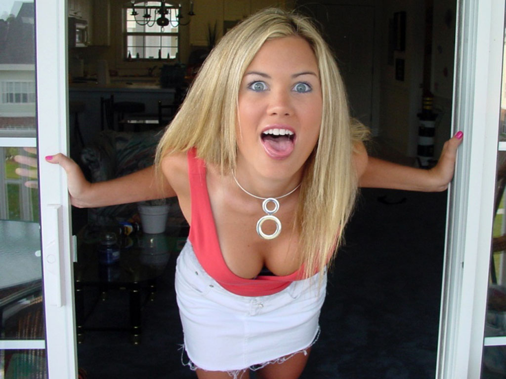 Cute Blonde With Beautiful Blue Eyes And A Sexy Cleavage